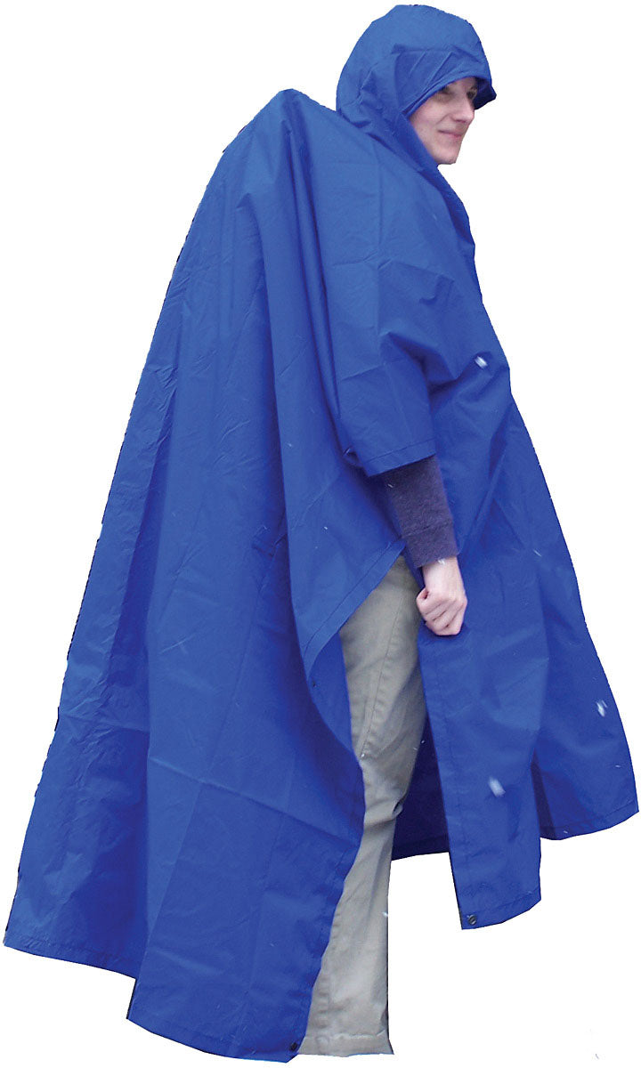 Side view of a model wearing a blue Equinox Terrapin Nylon Poncho with Extension