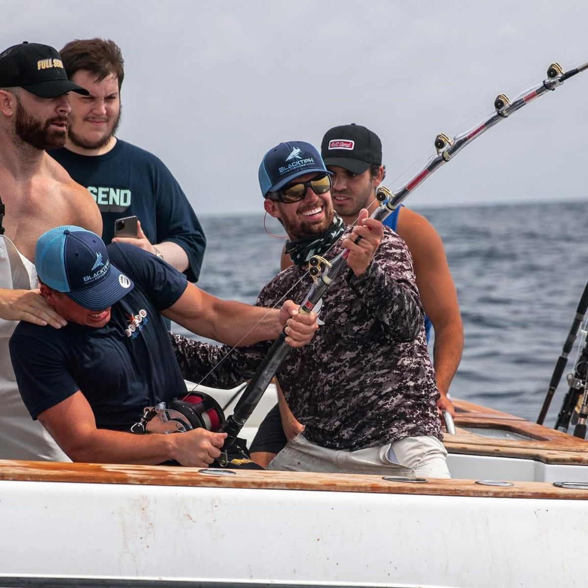 Anglers fishing from a boat in a Mustad BlacktipH image