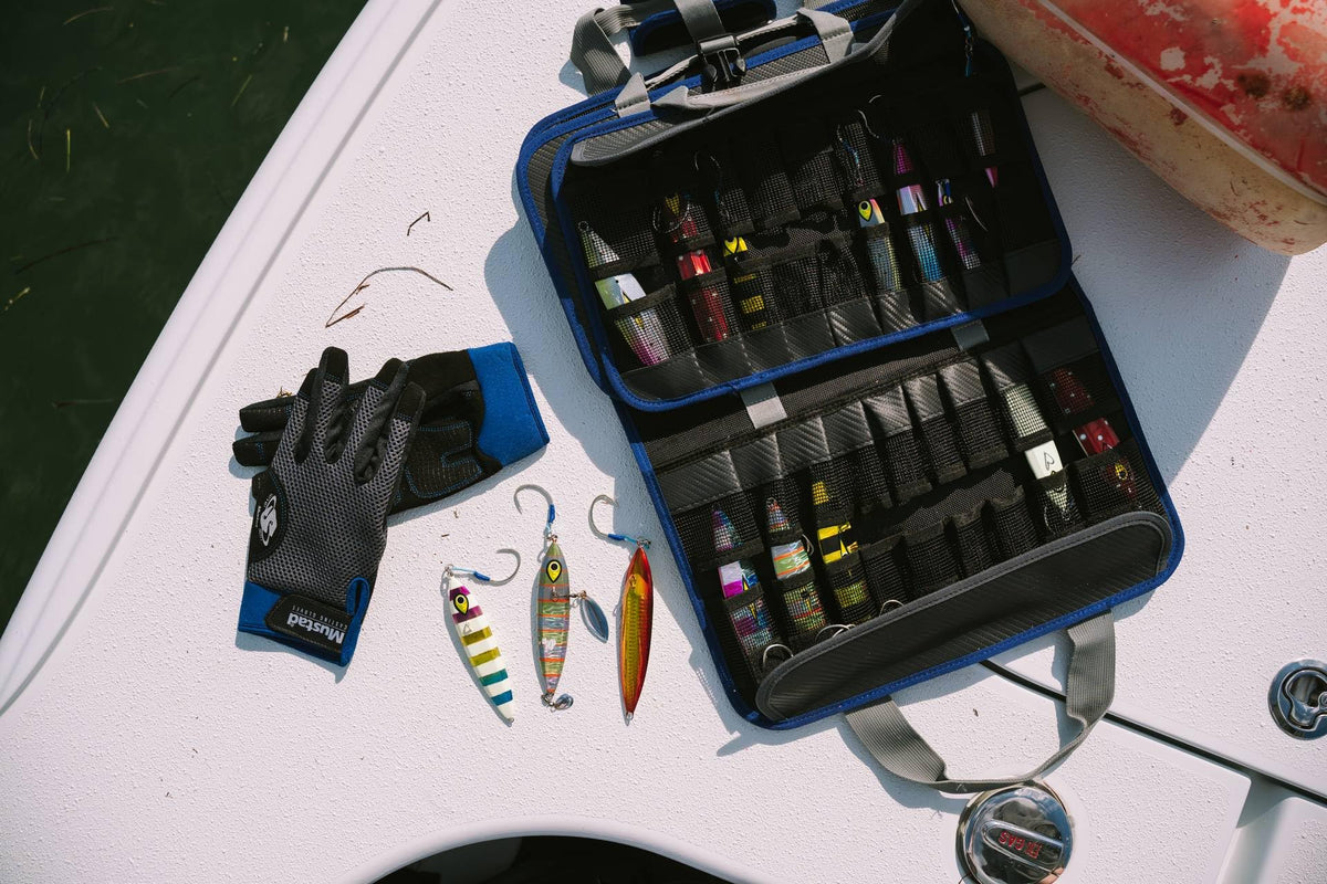 Mustad jig bag and tackle laid out on a boat