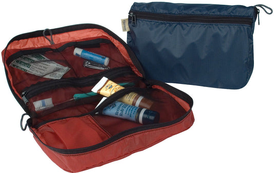 Equinox Monarch travel organizers shown open with toiletries in mesh pockets and closed in blue