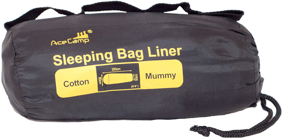AceCamp mummy-shaped cotton sleeping bag liner packed in its labeled stuff sack