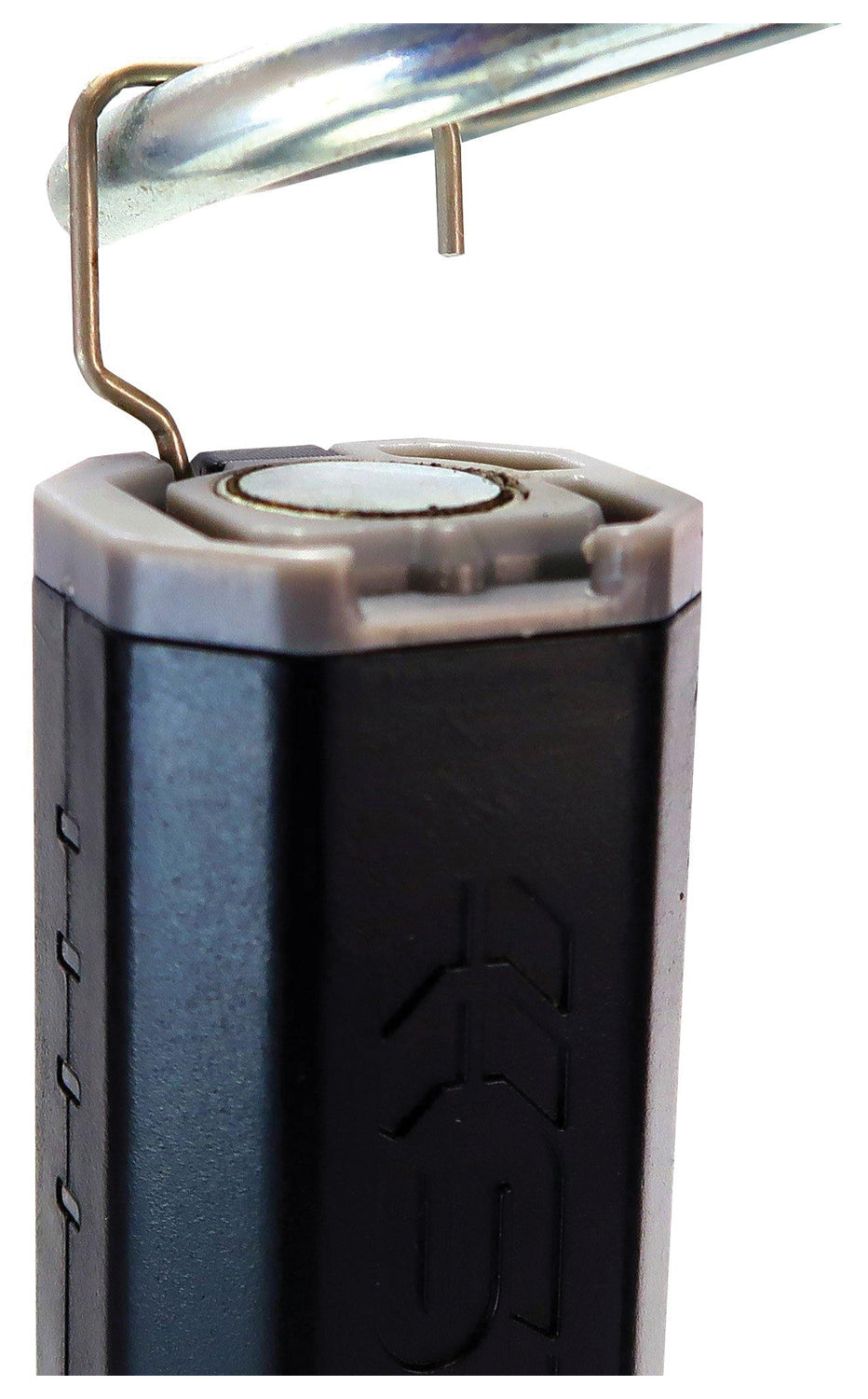 Close-up of the STKR FLEXIT Pocket Light 4.0 hanging hook on a metal rod