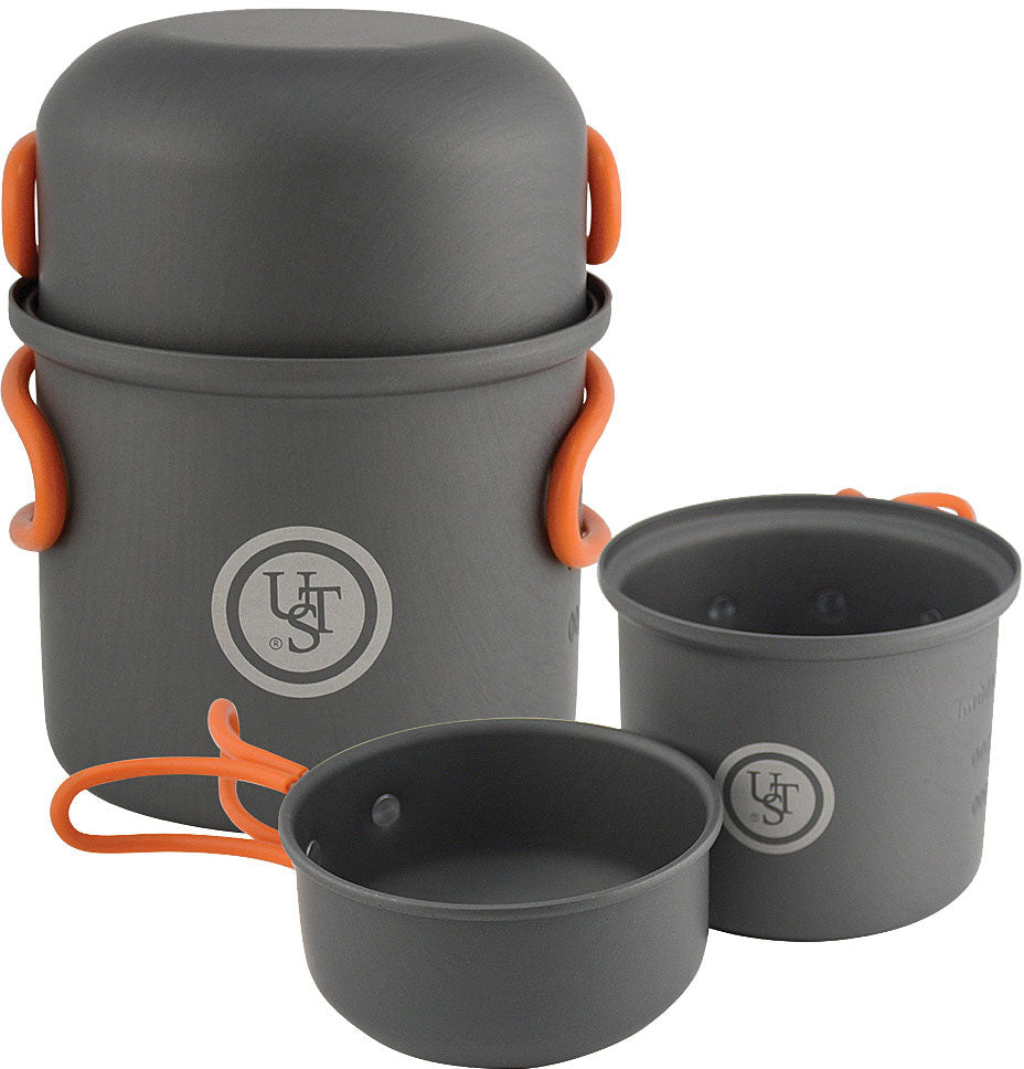 UST Solo Cook Kit pot and pan shown nested and open, with orange folding handles