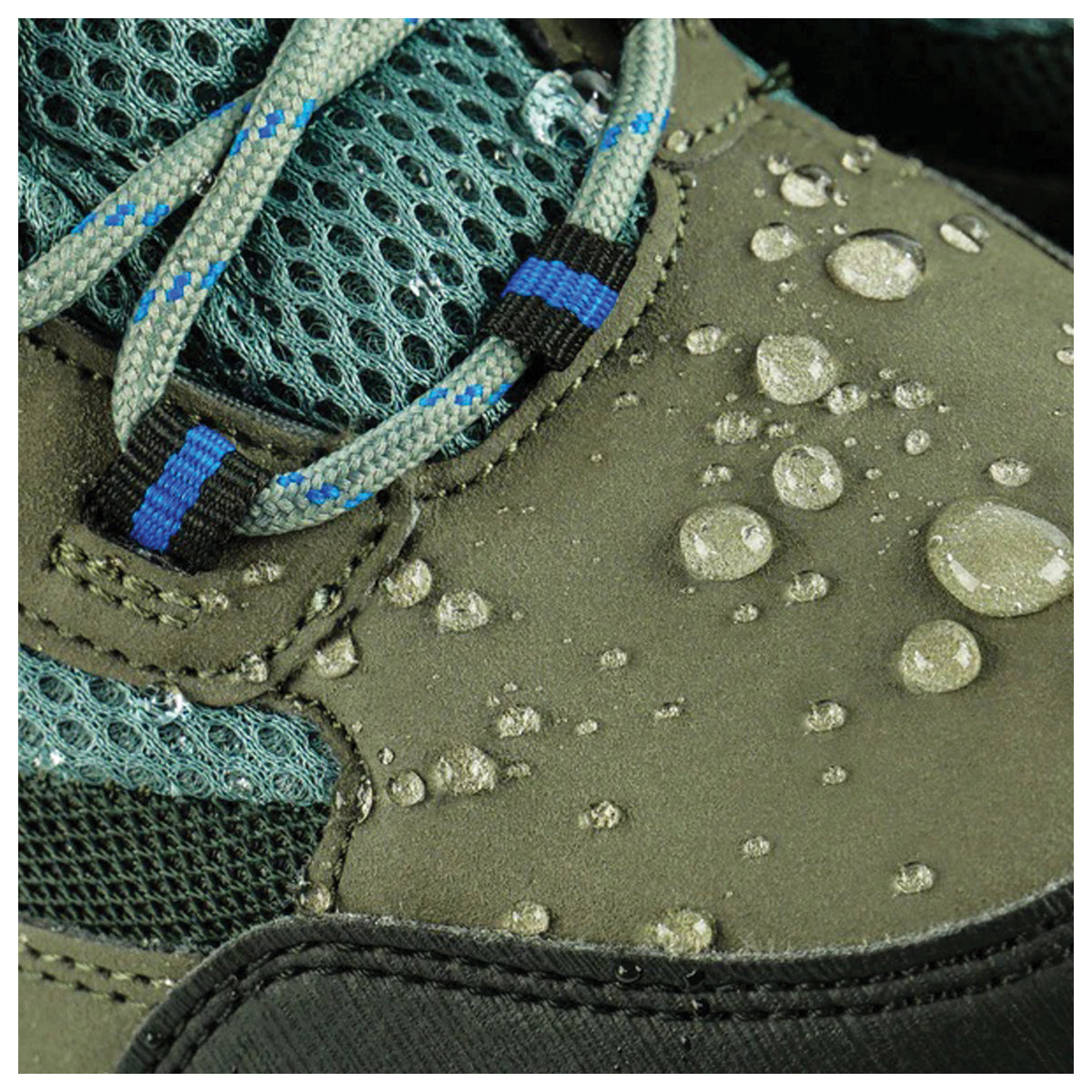 Water droplets beading on a green hiking shoe in the Grangers Footwear Repel Plus gallery
