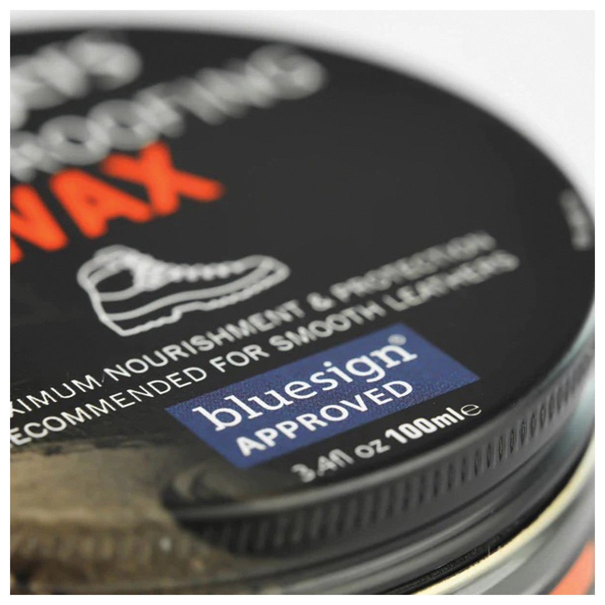 Close-up of the Grangers Waterproofing Wax lid and 100 ml marking