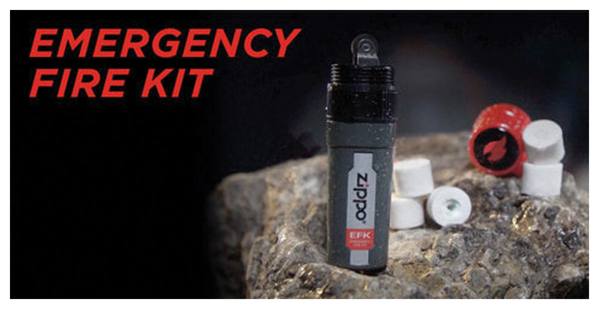 Zippo Emergency Fire Kit and tinder displayed on a rock