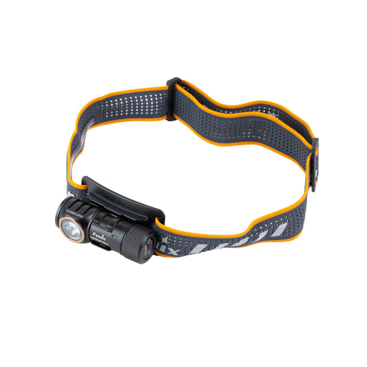Fenix HM50R V2.0 compact headlamp mounted on a black and yellow headband