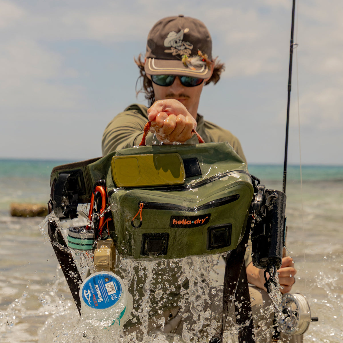 Hoss gear strap attached to a fisher's pack