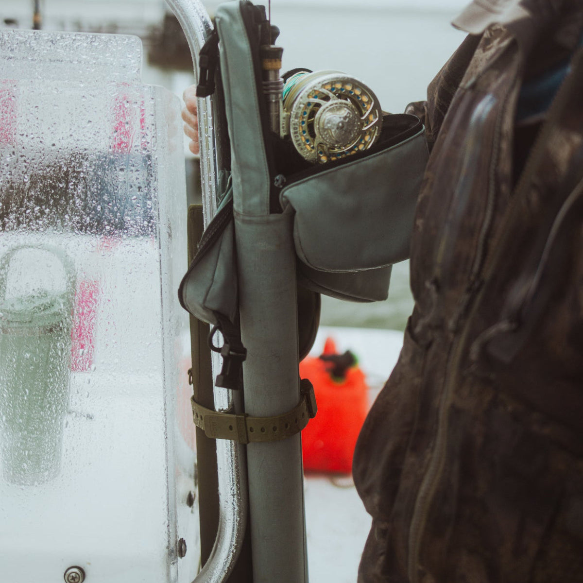 Hoss gear strap securing equipment to a boat support