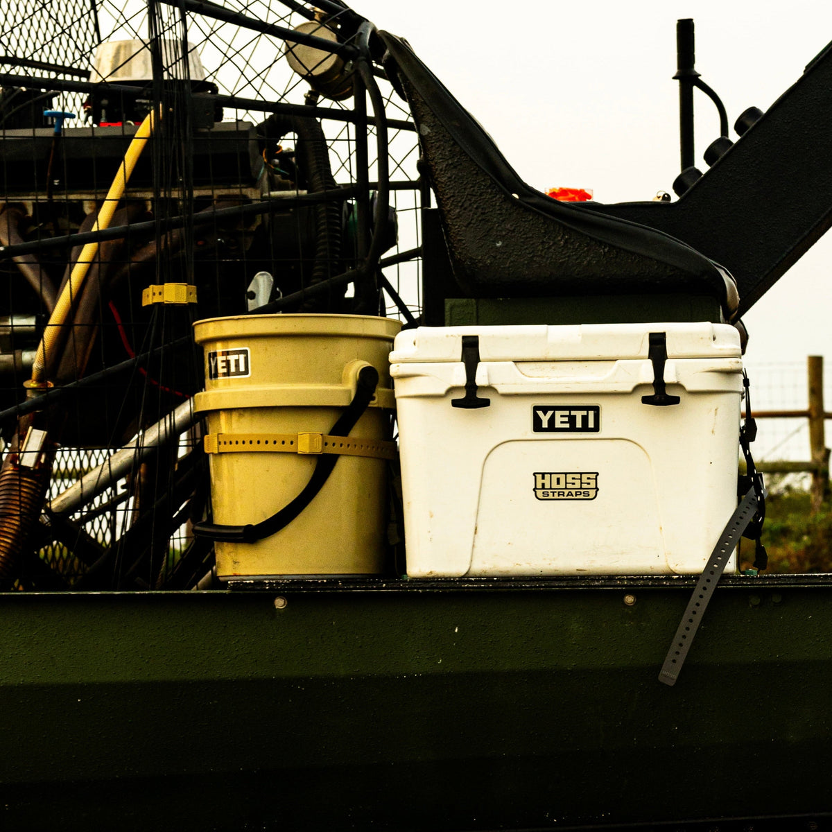 Buckets secured on a boat with Hoss straps