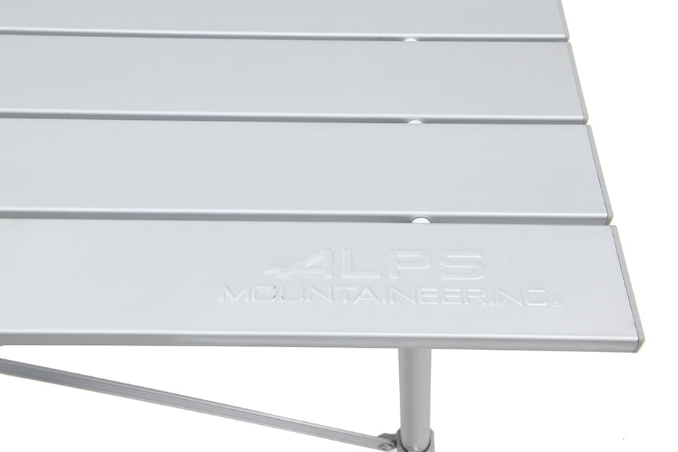 Close-up of silver Camp Table slats and embossed ALPS Mountaineering logo