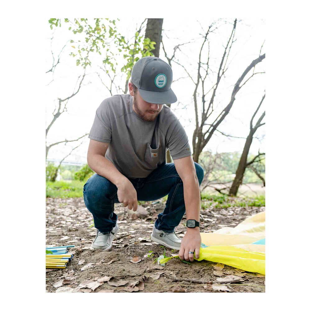 UST Zinx 9-inch interlocking tent peg in use securing a tent