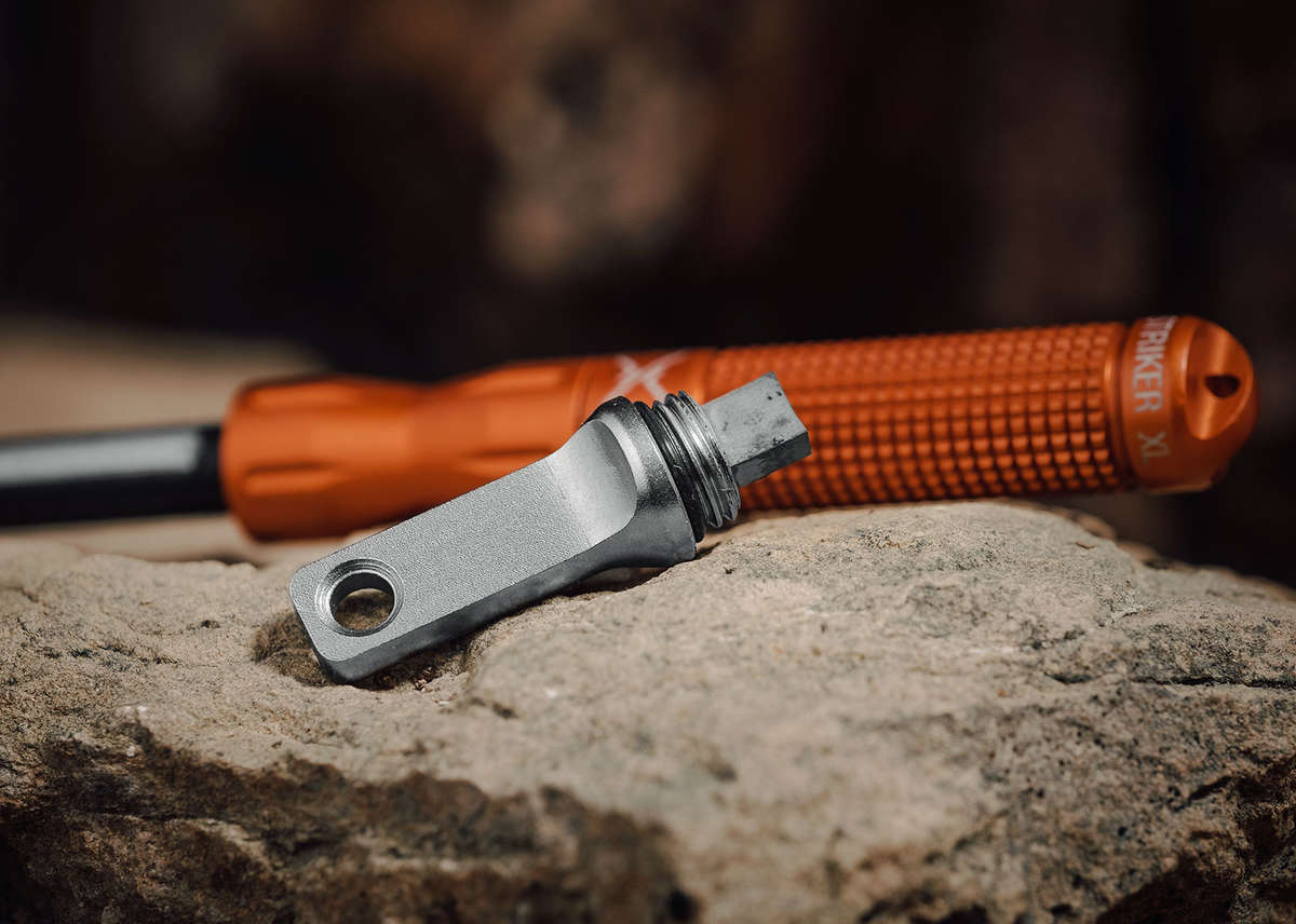 Close-up of the orange Exotac nanoSTRIKER XL striker