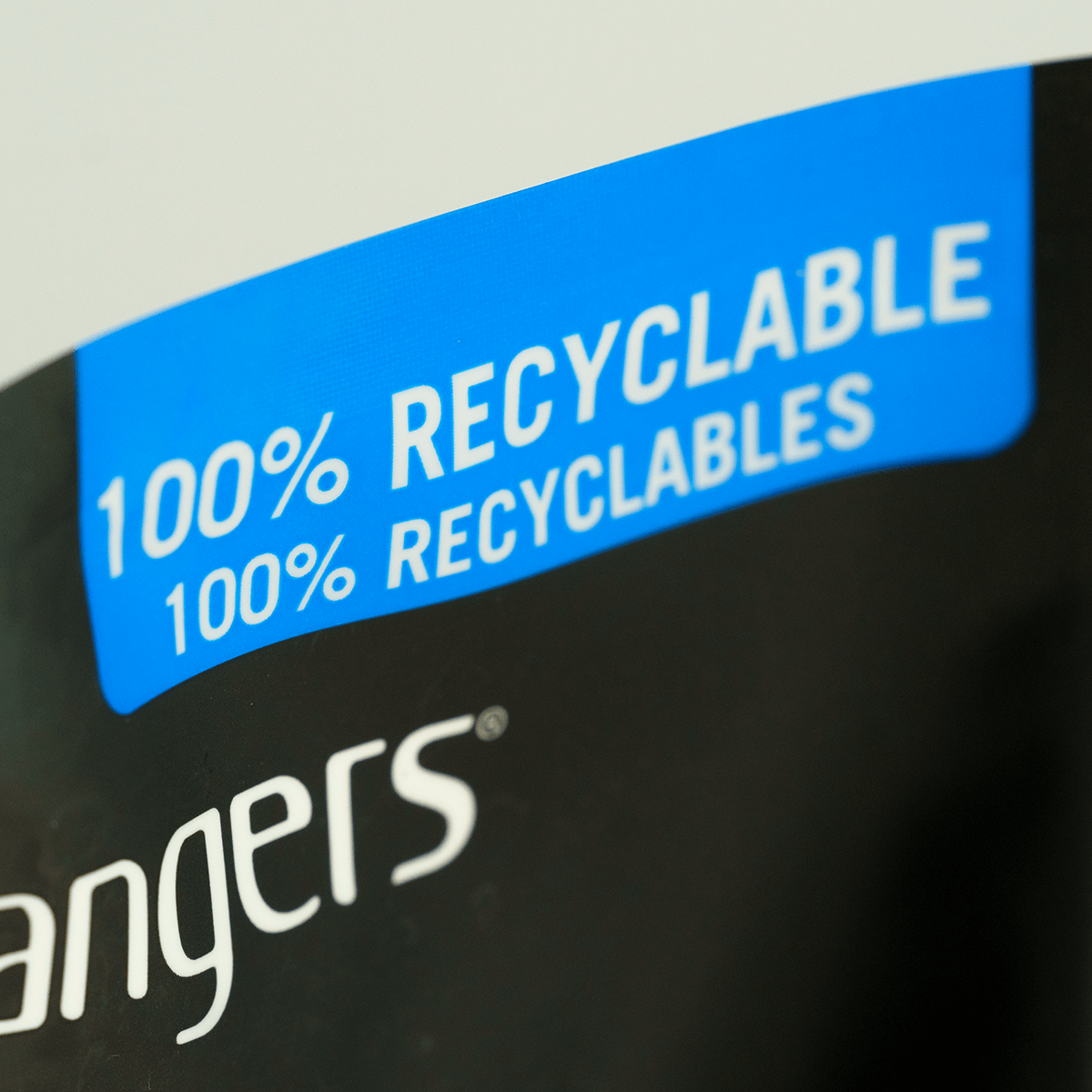 Close-up of the recyclable packaging label on the Grangers Wash + Repel Down pouch