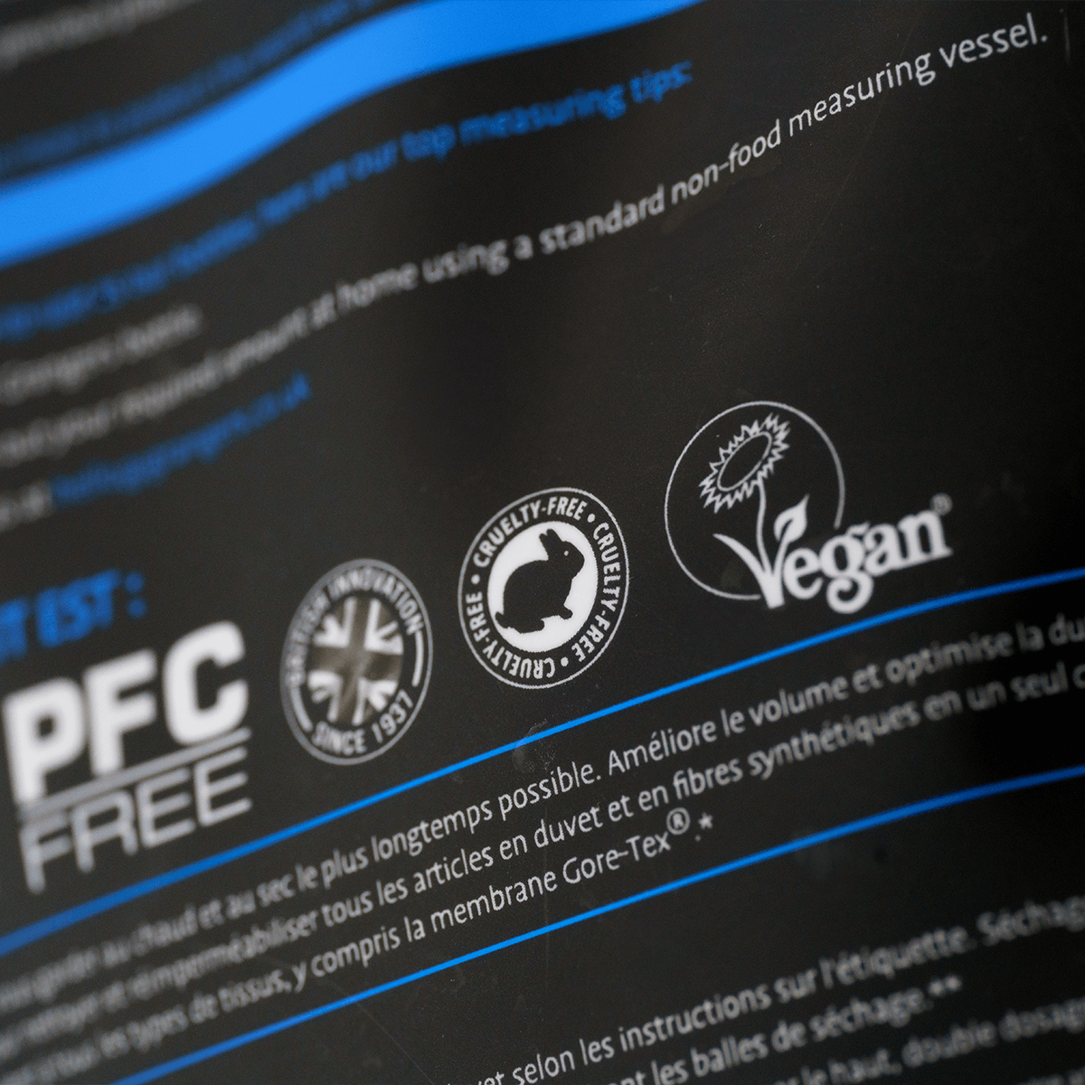 Close-up of the Grangers Wash + Repel Down pouch labels and measuring instructions