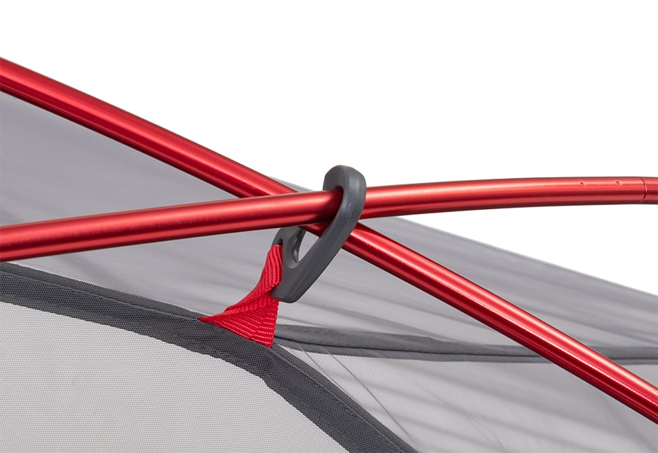 Close-up of crossing red poles and a suspension loop on an ALPS Helix tent