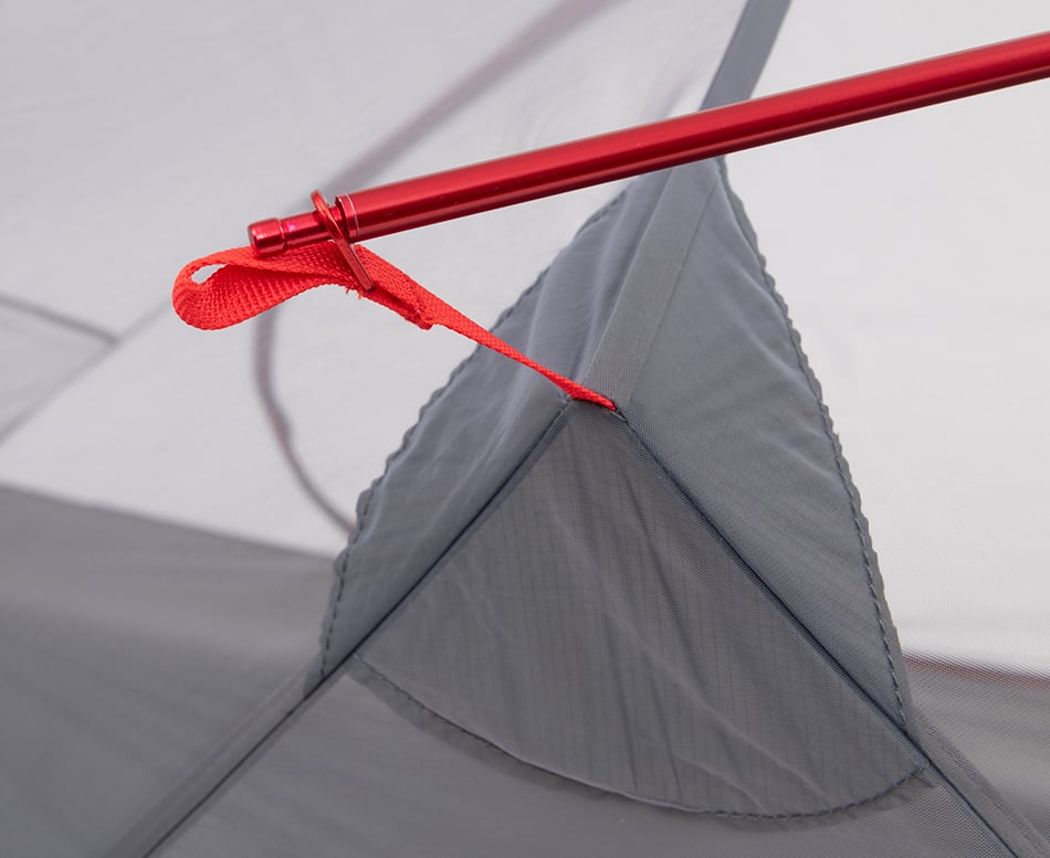 Close-up of the ALPS Helix cross-pole attachment above the door