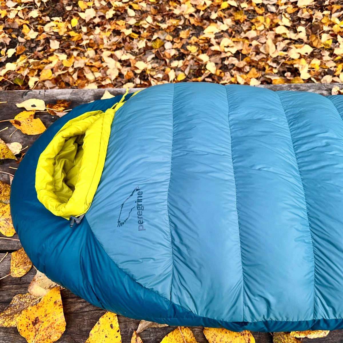 Overhead close-up of the Peregrine Anatum sleeping bag's blue baffles and hood