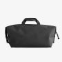 Black Magpul DAKA Takeout Large bag, front view with the side buckles released