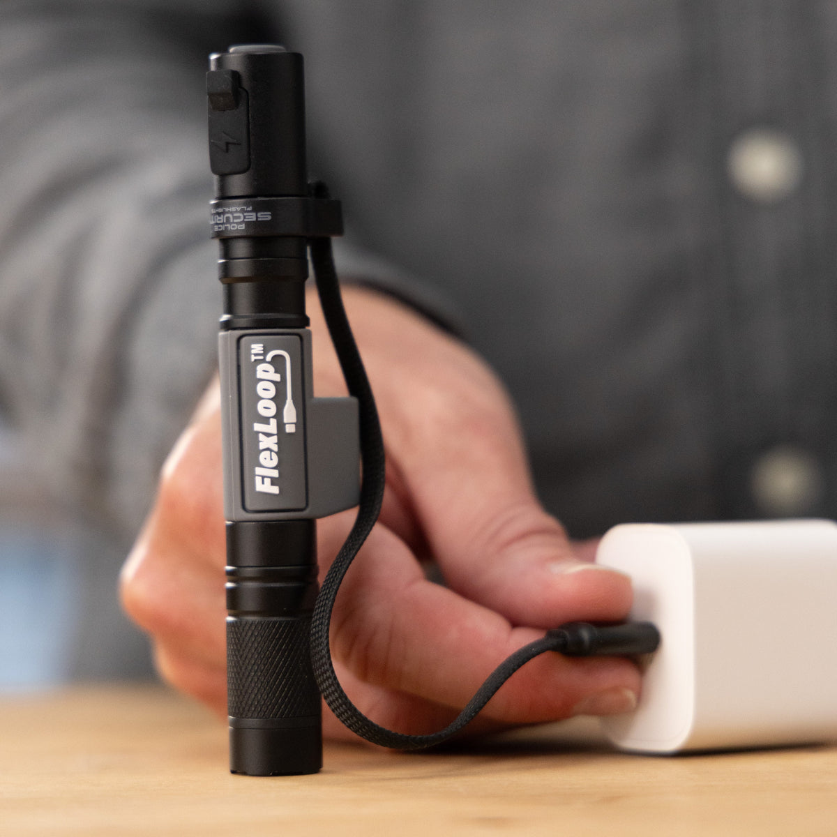 Police Security FlexLoop RS — attached charging cord in use