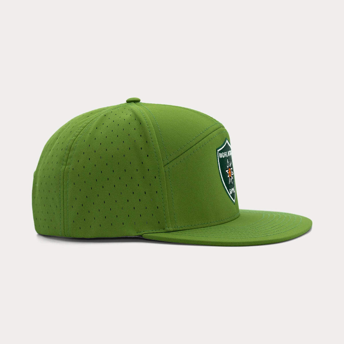 Green Pacific Outdoor Supply snapback hat, profile facing right