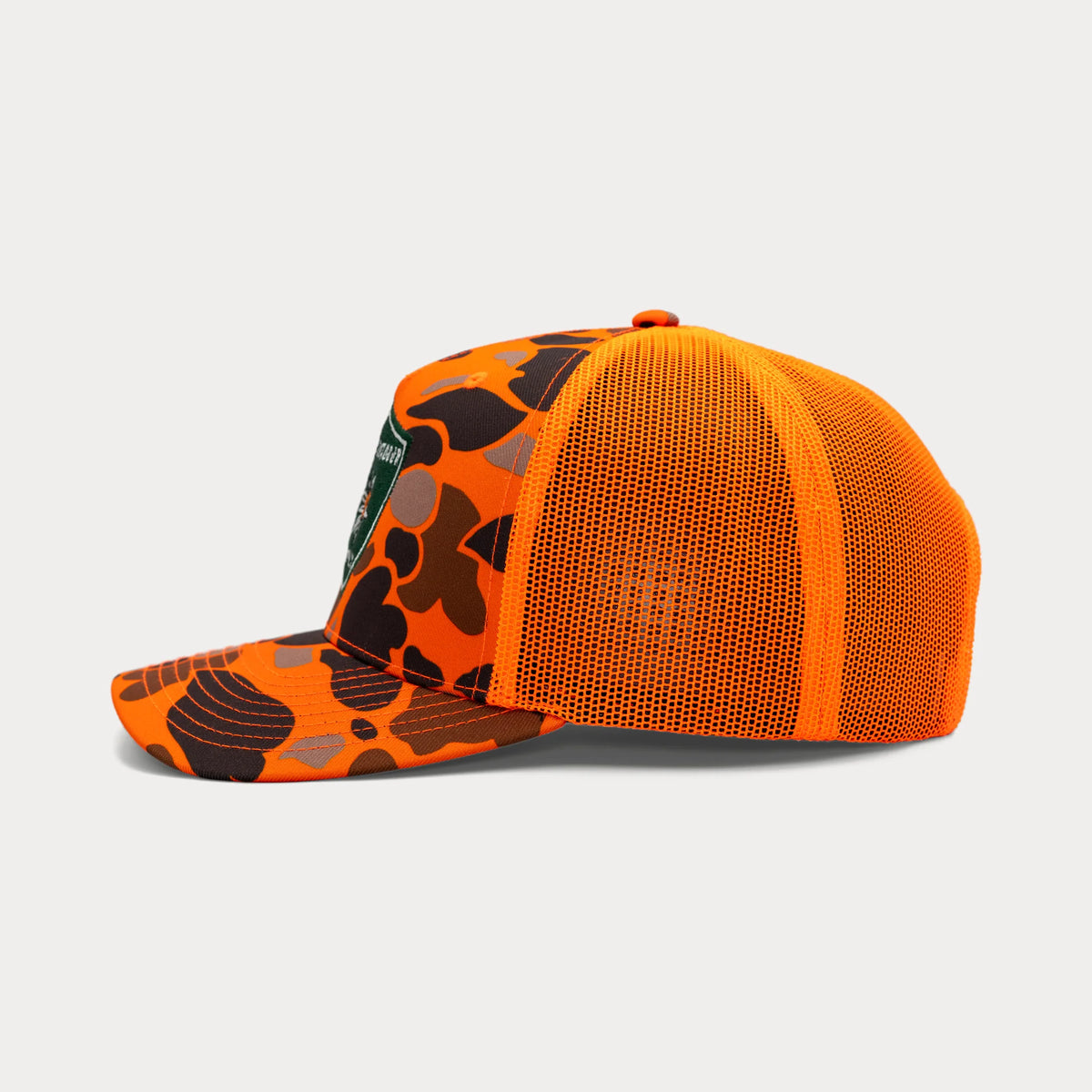 Orange camo Pacific Outdoor Supply trucker hat, profile facing left
