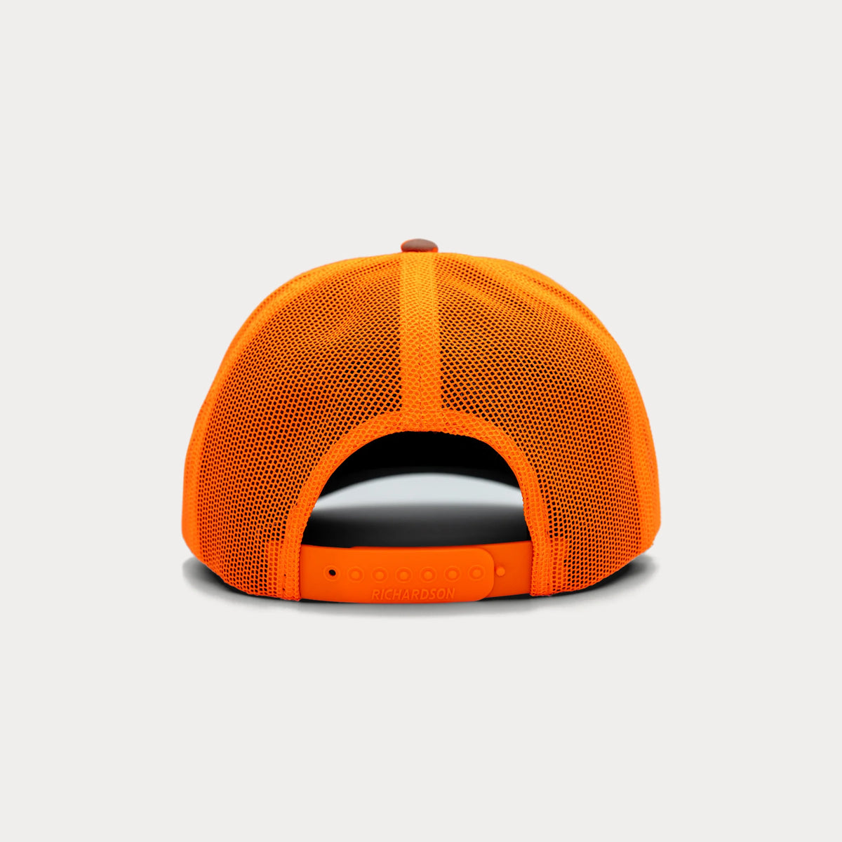 Back of orange camo Pacific Outdoor Supply trucker hat showing adjustable snapback