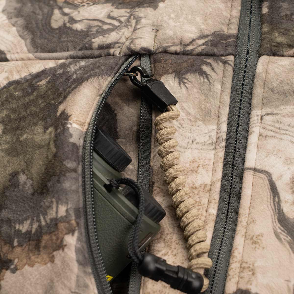 ScentLok BE:1 Silentude Jacket chest pocket and rangefinder tether detail