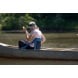 ALPS Mountaineering Weekender padded seat in blue used in a canoe